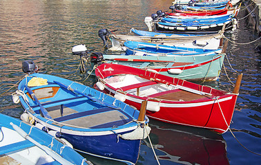 Image showing Many of small fishermen boats in the dock