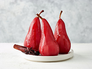 Image showing Pears poached in red wine