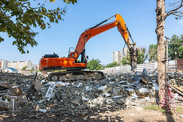 Image showing Demolition of a building with a jackhammer