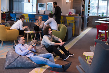 Image showing startup Office Workers Playing computer games