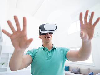 Image showing man using VR-headset glasses of virtual reality