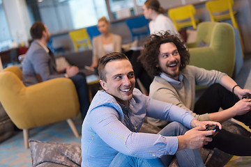 Image showing startup Office Workers Playing computer games