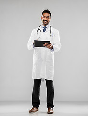 Image showing smiling indian male doctor with tablet computer