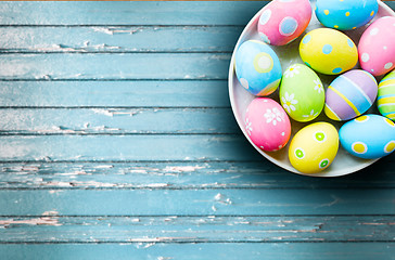 Image showing close up of colored easter eggs on plate