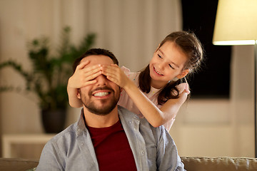 Image showing happy father and little daughter playing at home