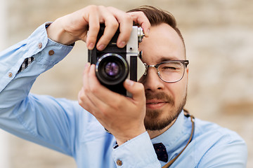 Image showing photographer or hipster with film camera outdoors