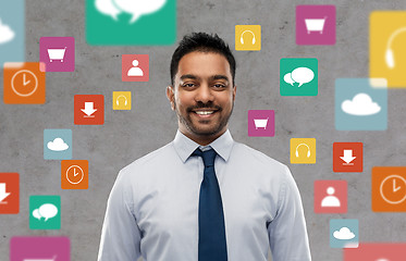 Image showing indian businessman over app icons