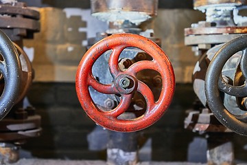 Image showing Industrial valve in an old factory