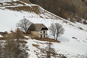 Image showing Ruined mountain house in winter