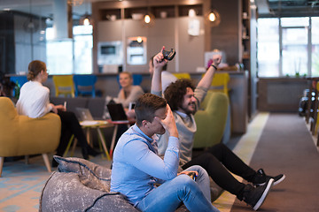 Image showing startup Office Workers Playing computer games