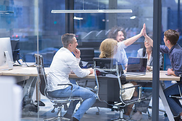 Image showing startup Group of young business people celebrating success