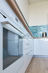 Image showing New and modern kitchen in bright colors
