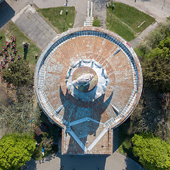 Image showing old pavilion building with trails on the territory of the National Exhibition Center in Kiev, top view.