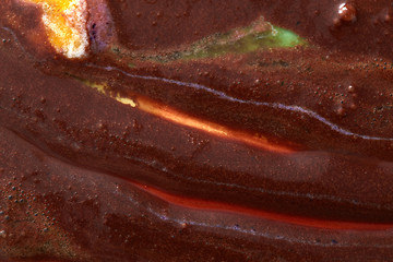 Image showing Melting fruits and chocolate ice cream is a abstractive decorate background of yellow and brown color.