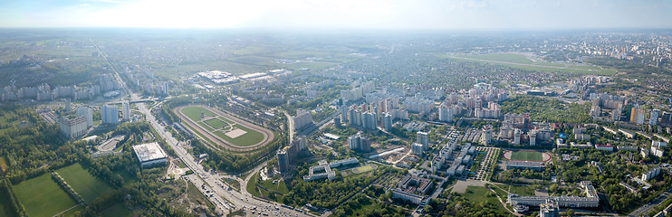 Image showing Aerial panoramic view of the cityscape with urban archtecture, streets and recreational areas, city Kiev, Ukraine.