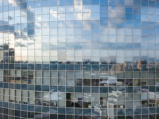 Image showing Cityscape reflection on a glass facade of modern office building in Kiev