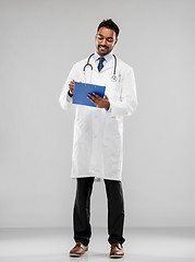 Image showing indian male doctor with clipboard and stethoscope