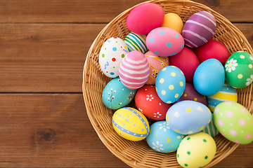 Image showing close up of colored easter eggs in basket