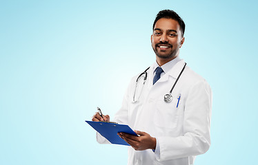 Image showing indian male doctor with clipboard and stethoscope