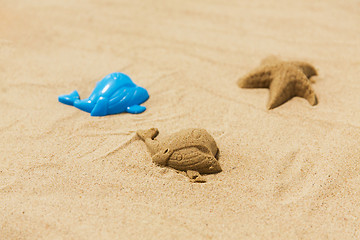 Image showing sand shape made by whale mold on summer beach