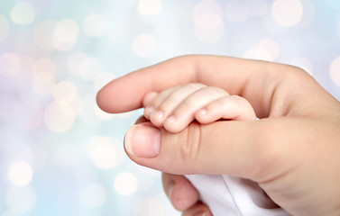 Image showing close up of mother and newborn baby hands