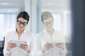 Image showing Business Woman Using Digital Tablet in front of startup Office