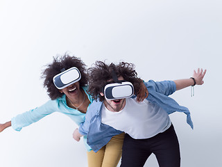 Image showing multiethnic couple getting experience using VR headset glasses