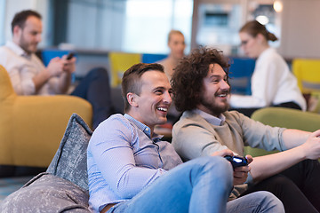 Image showing startup Office Workers Playing computer games