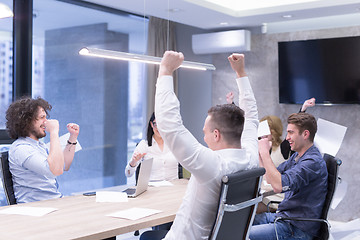 Image showing startup Group of young business people throwing documents