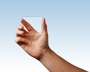 Image showing transparent glass represented in hand