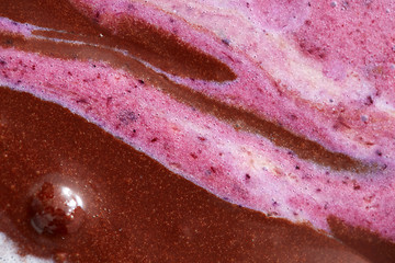 Image showing Abstractive structure of a mix colorful melted chocolate-berries ice cream close-up.