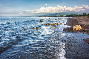 Image showing a dark sand beach in northern Bali Indonesia
