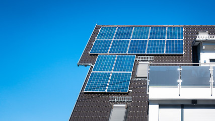 Image showing some solar panels on the roof of a private house