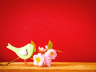 Image showing bird with a branch of blossoms easter holiday decoration backgro