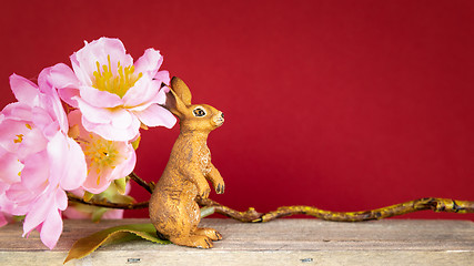 Image showing Easter decoration rabbit and cherry blossoms