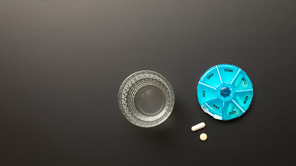 Image showing open pillbox with some pills