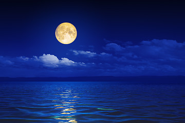 Image showing wide ocean waves horizon moon night background