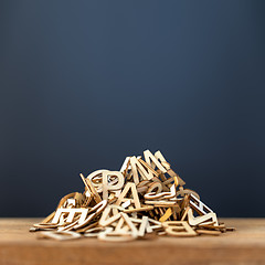 Image showing pile of wooden letters background