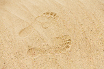 Image showing footprints in sand on summer beach