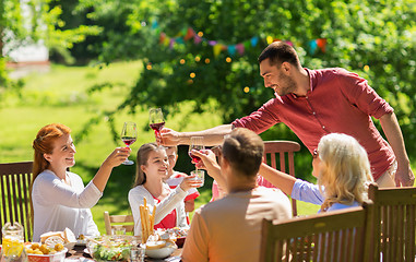 Image showing happy family having dinner or summer garden party