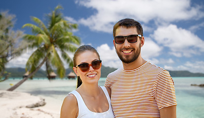 Image showing happy couple in sunglasses outdoors in summer