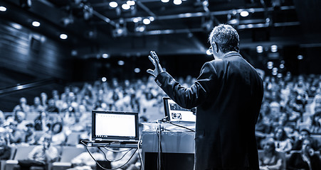 Image showing Public speaker giving talk at Business Event.