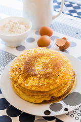 Image showing Stack of pancakes with baking ingredients