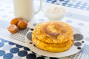 Image showing Stack of pancakes with baking ingredients