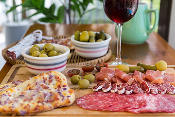 Image showing Spanish antipasti and appetizes with wine