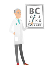 Image showing Caucasian ophthalmologist holding eyeglasses.