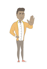 Image showing Young african-american man showing palm hand.