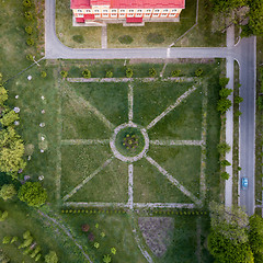 Image showing Aerial panoramic view from the drone to the national dendrological park Sofiyivka in city Uman, Ukraine in the summer at sunset