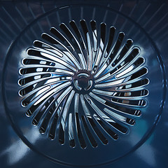 Image showing Close-up of metal fan. Inside the furnace