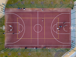 Image showing View strictly from the drone on the basketball court with the players.